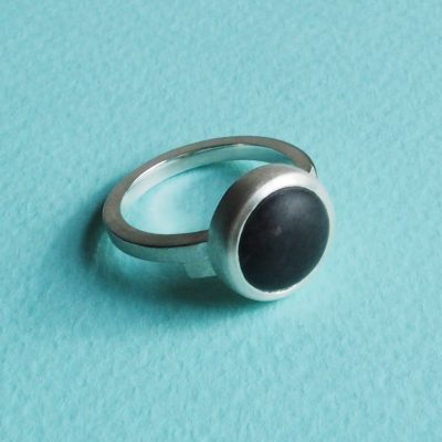 Sterling silver overlap ring featuring a large cabochon cut from a beach pebble. February 2017